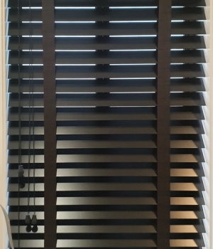 Black venetian blinds