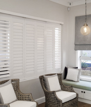 White-shutters-and-Roman-Blind