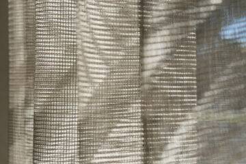 Detailing on custom made sheer curtains